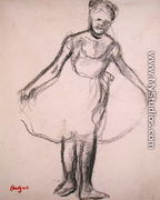 Standing Dancer Holding Tutu - Edgar Degas
